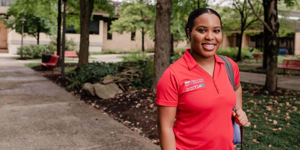 AACC student posing outside of library.